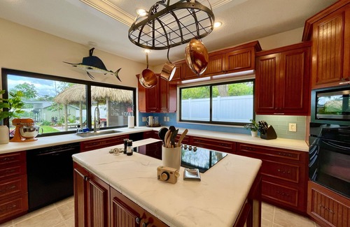 Lake Worth House | 1-Acre Resort-Style Paradise Near West Palm Beach, Heated Pool, Tikis, Sleep 14