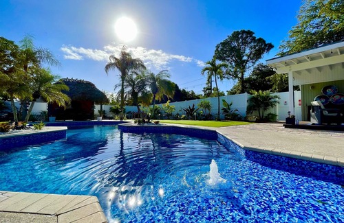 Lake Worth House | 1-Acre Resort-Style Paradise Near West Palm Beach, Heated Pool, Tikis, Sleep 14