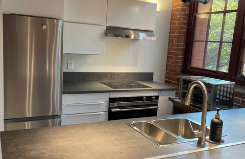 Torrington Apartment | 1 bedroom in a factory converted loft, with fitness room, WiFi in Torrington