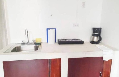 Zona 4 Apartment | 1 Comfy Dual Apt: Convenience & Comfort Galore!