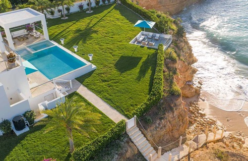West End Village Villa | 10,000 square feet of exquisite modern living with direct beach access