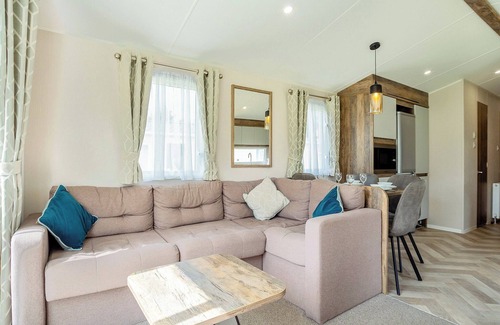 Bridport House | 12ft-wide luxury caravan with one double and two twin.