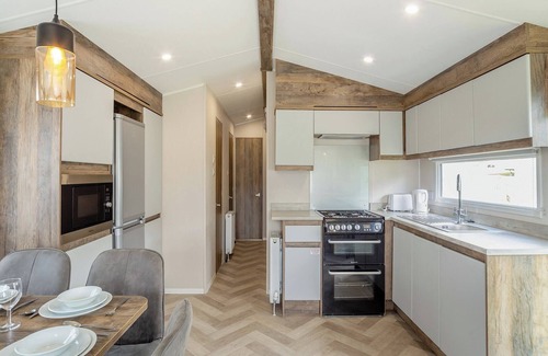 Bridport House | 12ft-wide luxury caravan with one double and two twin.