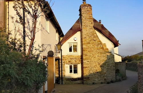 Croyde House | 16th century thatched cottage with swimming pool, driect access onto beach path
