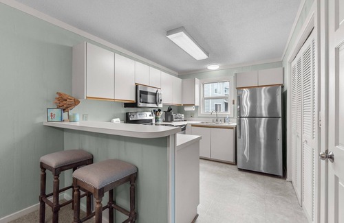 Ocean Sands Condo | 1834 - Carolina Grace, Beautifully decorated condo in Corolla with community pool outside!