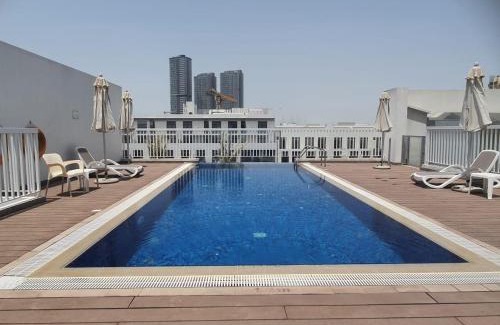 Jumeirah Village Circle Apartment | 1bd apt plus study I Close to mall I Fast wi-fi