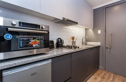 Cape Town City Centre Apartment | 1onAlbert 1 Bedroom in Woodstock with Pool & Gym