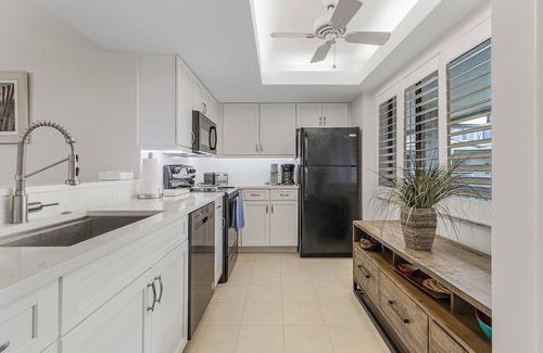 Bonita Bay Condo | 2/2 Corner Unit Condo in Bonita Bay! Large Lanai Space!