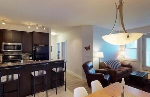 East Kootenay Condo | 2 BDRM/Hot Tub & Pool/AC/Fireplace