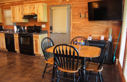 Swinging Bridge Village Cabin | 2 Bedroom Little Red Riverfront Cabin on Winkley Shoals