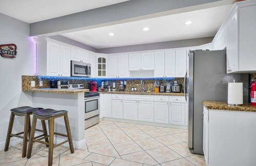 Coral Way House | 2 Homes, King Beds, for 23 NearBeach/Airport