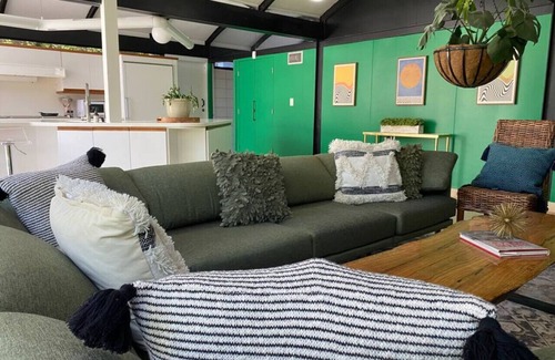 Mid City South House | 2 mi from LSU! Midcentury Modern Luxury W/Game Room - Sleeps 10