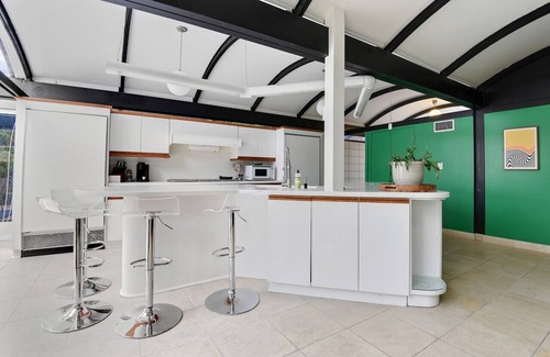 Mid City South House | 2 mi from LSU! Midcentury Modern Luxury W/Game Room - Sleeps 10
