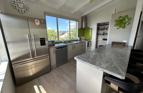 Whangamata House | 2 storey holiday home - two minute walk to shops & cafes in beautiful Whangamata