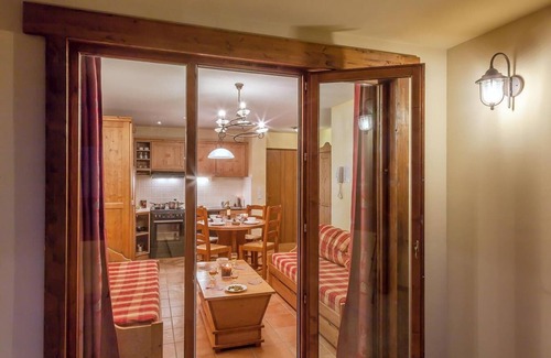 Lanslevillard Apartment | 200m from ski slopes, fitness, swimming pool, sauna, hammam, balcony, tv, ski locker, 35m²
