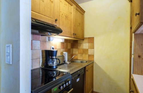 Lanslevillard Apartment | 200m from ski slopes, fitness, swimming pool, sauna, hammam, balcony, tv, ski locker, 43m²