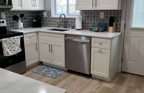 Silver Sands Beach Condo | 2022 Renovation! Surf side and stones throw from the beach!