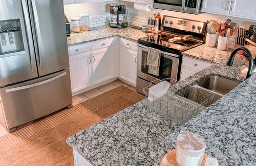 Gateway House | 2BD 2.5BR Private Gated Lakefront Denver Property near Airport and Downtown