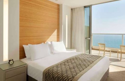 Netanya House | 2BR Suite steps from the beach