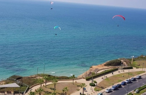 Netanya House | 2BR Suite steps from the beach