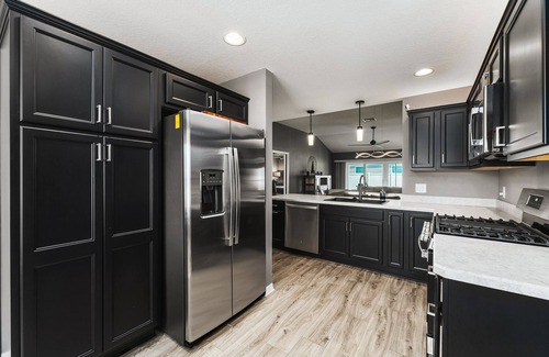Wildwood House | 3 Bed 2 Bathroom Home in DeLuna with golf cart.