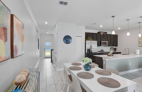 Four Corners House | 4-bedroom 3-bath townhome in brilliant Championsgate Davenport with AC and pool