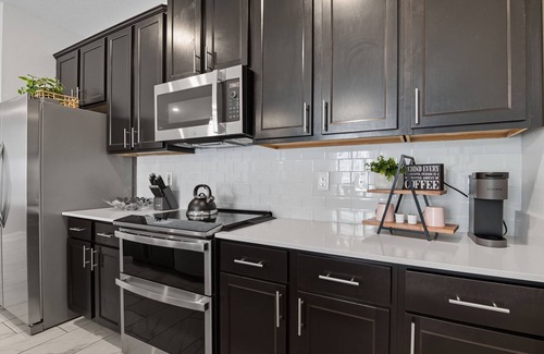 Four Corners House | 4-bedroom 3-bath townhome in brilliant Championsgate Davenport with AC and pool