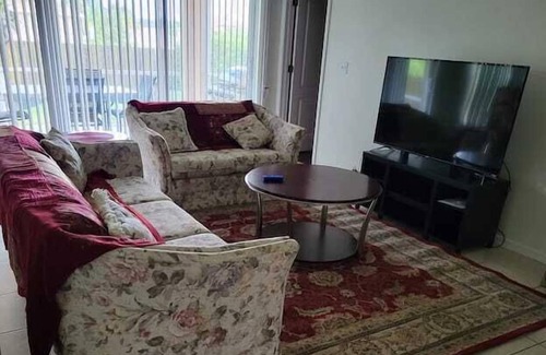 Sunshine Apartment | 4 Bedroom 698037 by Houzlet