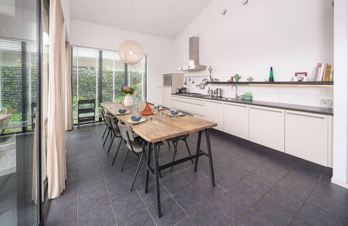 Zeewolde House | 4-person villa with green garden, private jetty, 2 bathrooms, hammock, canoe and sunny terrace. Located at Villa Resort Harderwold between forest and water!