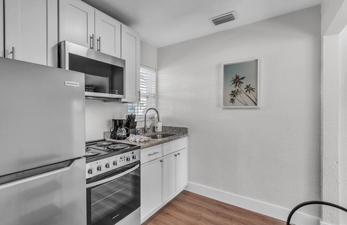 Treasure Island Apartment | 🌞400 ft to the Beach👙Onsite Heated Pool🐬Bungalows #2🌴Grills🐶Dogs Welcome!