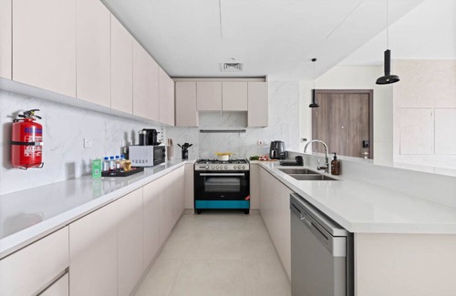 Bur Dubai Apartment | 41st-Floor 2BR with World's Highest Running Track