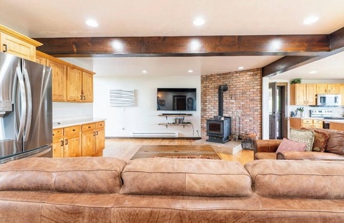 Colorado Springs House | 4BR 4BA multi-family with multiple outdoor & indoor living spaces, hot tub, BBQ.