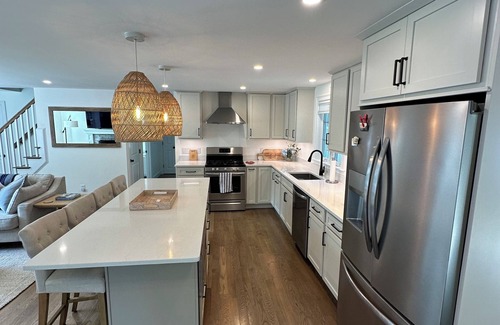 East Falmouth House | 4BR, new basement reno, water views, fenced in yard, community beach access!