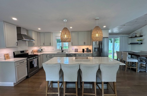 East Falmouth House | 4BR, new basement reno, water views, fenced in yard, community beach access!