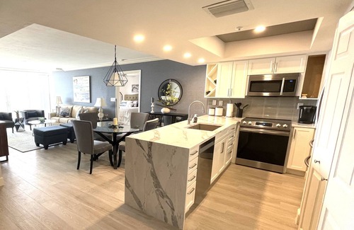 Pelican Bay Condo | 5 min walk to private beach with access to restaurant, bar and beach chairs.