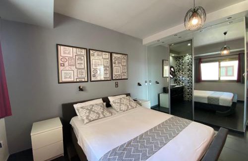 Kropia Apartment | 5-Star feel - Luxury penthouse for 4 with huge balcony & view ,8 min from Athens airport
