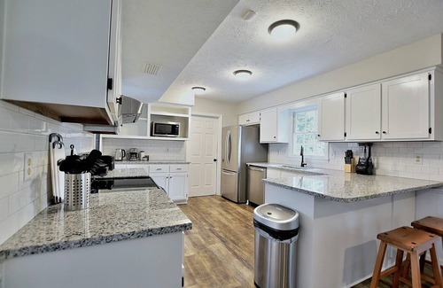 Fortson House | 5BR, 3BA Spacious N. Columbus Villa w/Hot Tub, BBQ, Play Area, 13 mi. to Benning