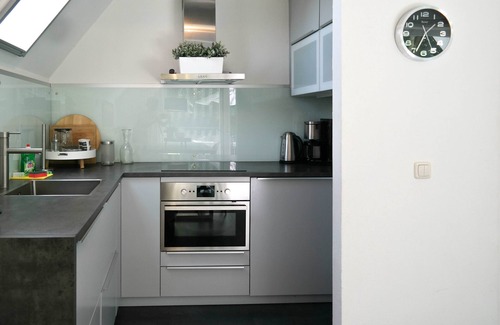 Anjum House | 6 Pers - Holiday home with sunny terrace by a typical Dutch canal