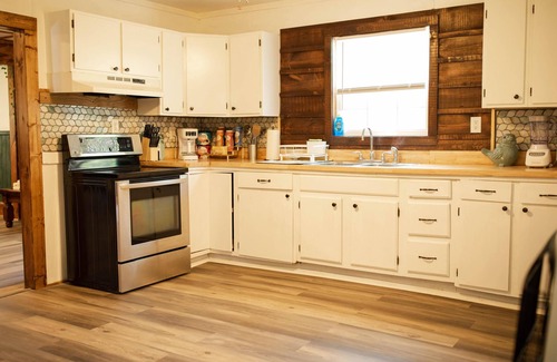 Sharpsburg House | 9511 Compressor Rd, Chesterhill, OH - Outdoor Movie Theater with Outdoor Kitchen and Games