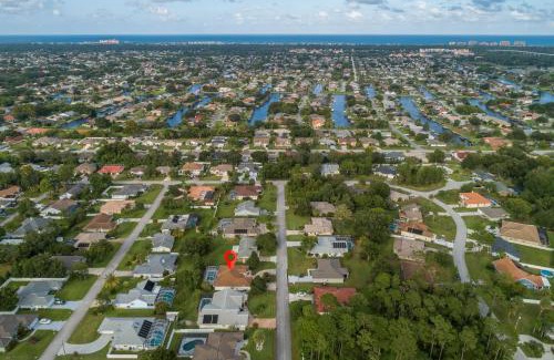 Palm Harbor House | 9863SANDYDRPCHN - Summer Daze