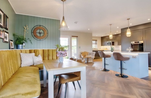 Pooley Bridge Cottage | A attractive and spacious Lodge with the River Eamont running beside it.