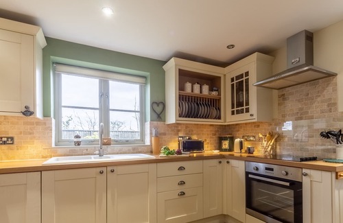 Docking House | A beautifully presented modern cottage-style detached house, situated in a quiet position well away