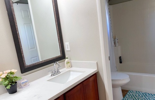 Eastvale House | A large room with independent access is in a one-story house