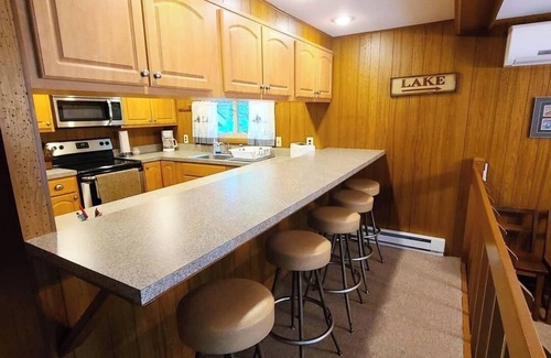 Pocono Pines House | A quaint wooded lakefront home with private beach!