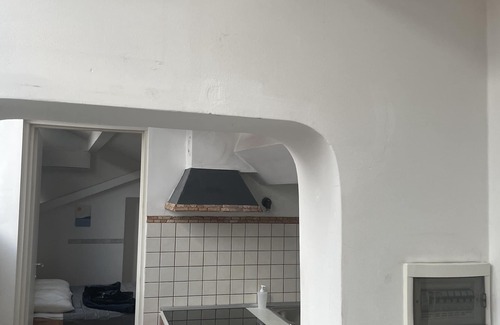 San Fruttuoso Apartment | A Roof in the City Genoa