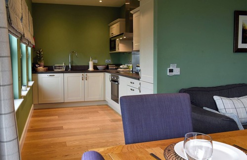 Linlithgow Cottage | A rural property based on a working farm with wood burner.
