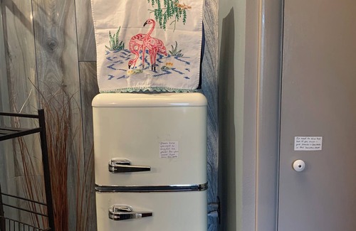 The Dalles Apartment | A shady retreat within a flower garden, with a boutique hotel feel. Close in