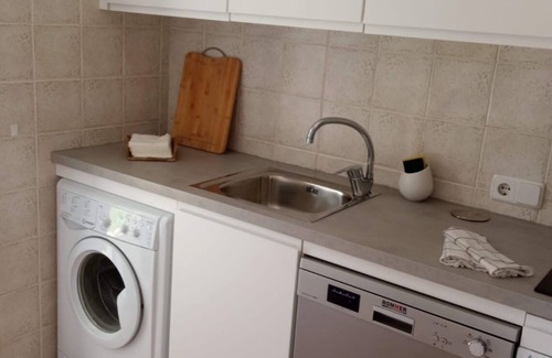 Arenal d'en Castell Ski Chalet | A stylish villa on the beach, with garden, pool and WIFI . pure rest