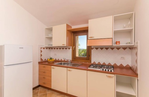 Porto San Paolo House | Acacia 4 - Vista Village by Interhome