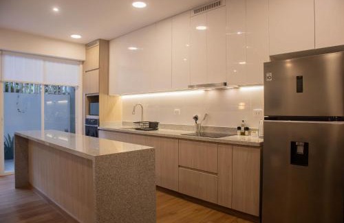 Armendariz Apartment | Acacias Coastal Apartment by Wynwood House